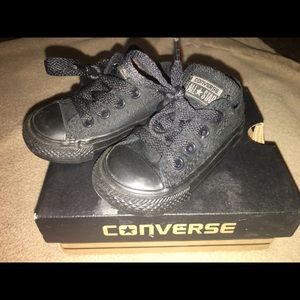 All black low top converse